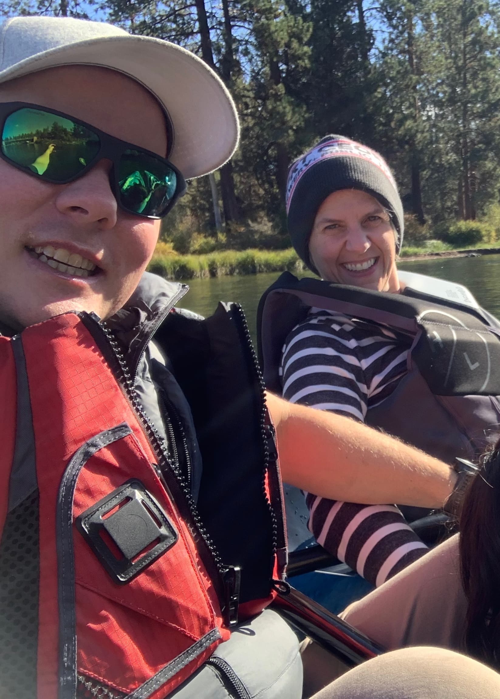 Kayaking adventure in Oregon with beautiful pine trees and lake scenery